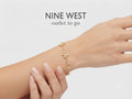 Nine West Tobillera Pulsera de flores doradas