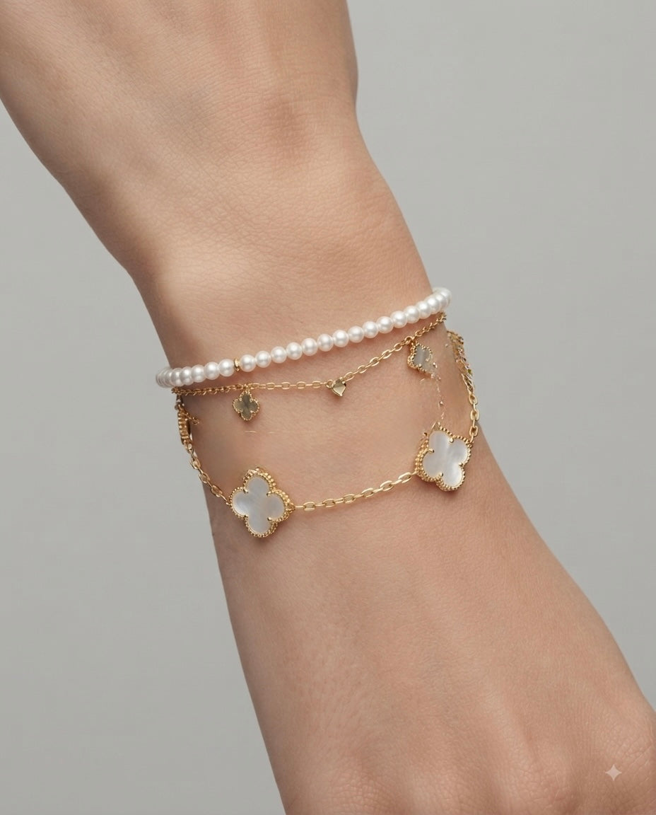 Noir Set Pulseras Doradas Trébol y Perlas