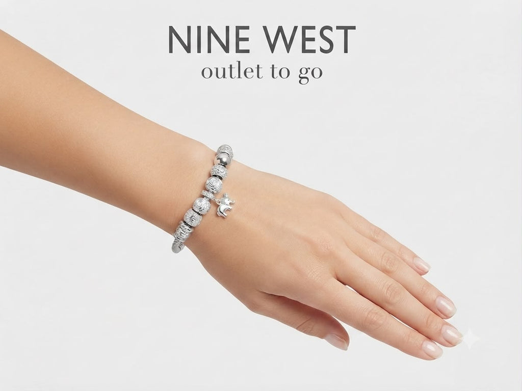 Nine West Pulsera Charms Elefante Plateada