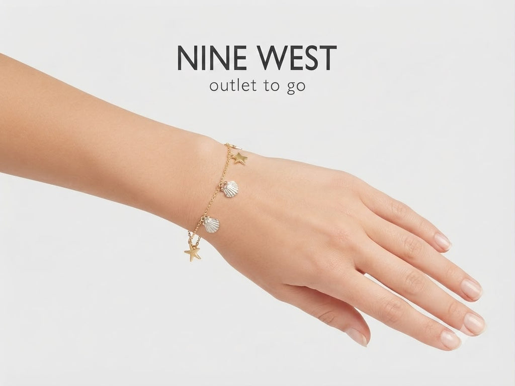 Nine West Pulsera Charms Marinos Dorada